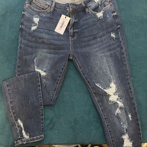 Mid Rise distressed Judy Blue skinny jeans. NWT